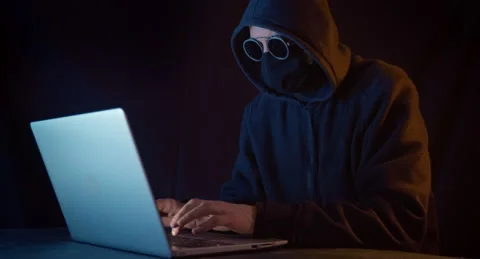 Cyber Hacker Enters Sit Down Examines Stock Footage Video (100