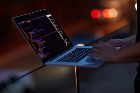 Hacker, code and laptop with hands of person for ransomware, cyber security and Stock Photos