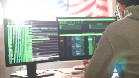 Hacker code blinks of the monitor screen. Man writes code and programs. Stock Footage 131153371