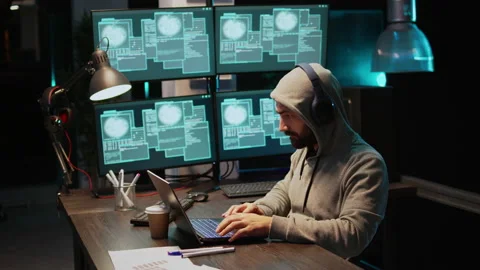 Hacker coder hacking system at night using virus 動画素材 221873579