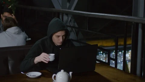 Hacker Coding in Cafe Stock Footage 105286583