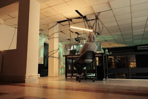 Hacker coding malware, stealing banking account data 写真素材