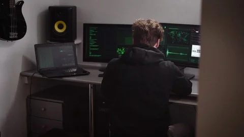 Hacker collects various computer data for hacking database. Specially trained Stock Footage 72404698