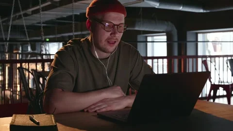 The hacker communicates via video link with the person he is trying to deceive Stock Footage 258613441