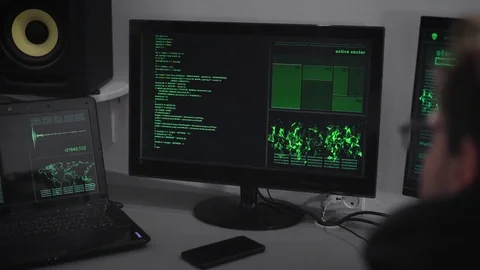 Hacker Company. A hacker is preparing for a cyber-attack. A man at a rapid pace Stock Footage 72406214