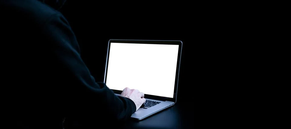 Hacker computer cyber security. Digital laptop in hacker man hand isolated on Stock Photos