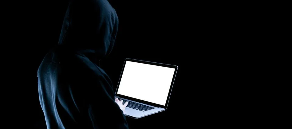 Hacker computer cyber security. Digital laptop in hacker man hand isolated on Stock Photos