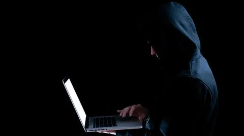 Hacker computer cyber security. Digital laptop in hacker man hand isolated on Stock Photos