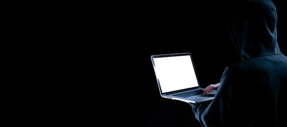 Hacker computer cyber security. Digital laptop in hacker man hand isolated on Stock Photos