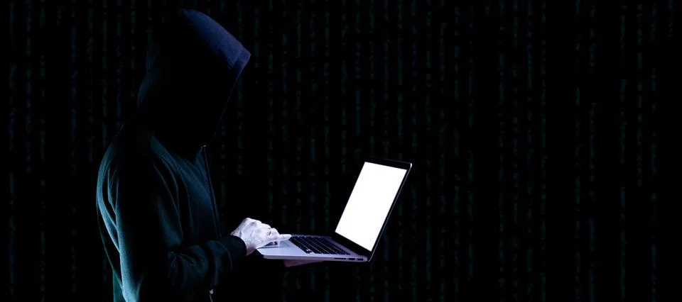 Hacker computer cyber security. Digital laptop in hacker man hand isolated on Stock Photos