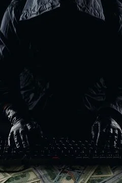 Hacker with Computer Keyboard Stock Photos