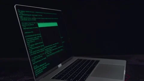 Hacker Concept. Code On A Laptop Computer Monitor In A Dark Room Stock Footage 157193161