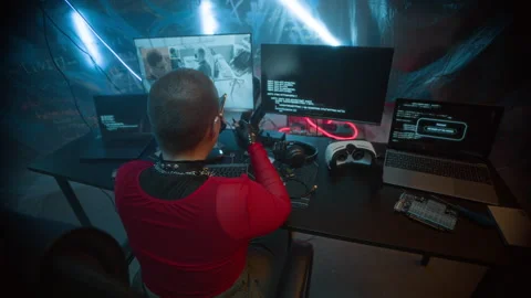 Hacker Connecting Devices while Programming and Monitoring in Cyberpunk Room 스톡 동영상 327638432