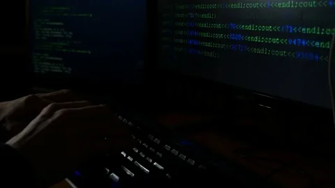 A hacker cracked an Internet code, an attacker was working on his computer Stock Footage 125555300