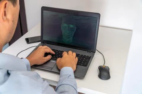 Hacker creating an artificial intelligence software program 写真素材