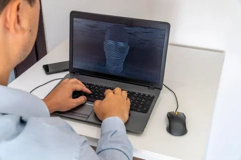 Hacker creating an artificial intelligence software program 写真素材