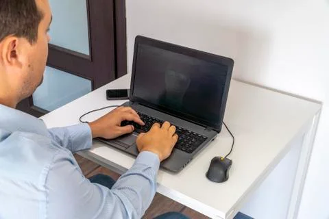 Hacker creating an artificial intelligence software program Stock Photos