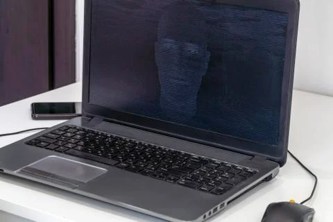 Hacker creating an artificial intelligence software program Stock Photos