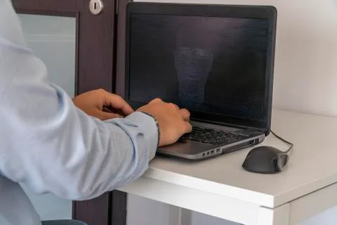 Hacker creating an artificial intelligence software program Stock Photos