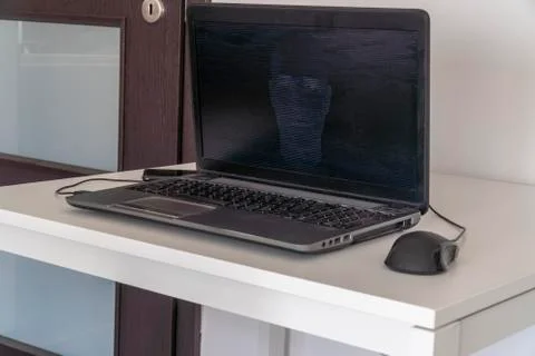 Hacker creating an artificial intelligence software program Stock Photos