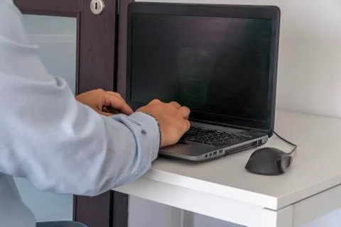 Hacker creating an artificial intelligence software program Stock Photos