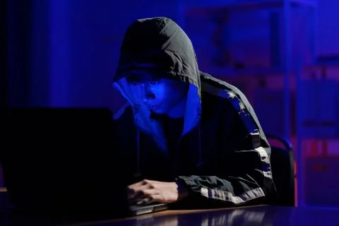 Hacker cyberattack data breach security threat digital crime Stock Photos
