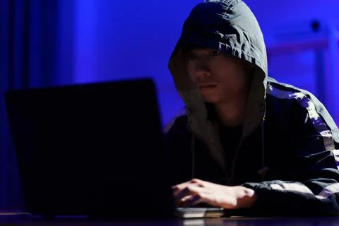 Hacker cyberattack representing data breach and cybersecurity threat in digit Stock Photos