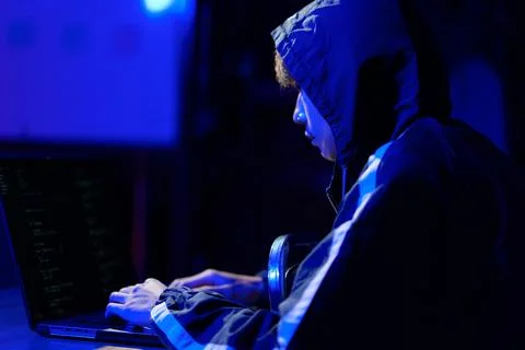 Hacker cyberattack representing data breach and cybersecurity threat in digit Stock Photos