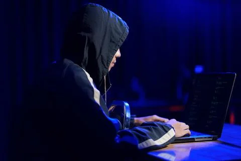 Hacker cyberattack representing data breach and cybersecurity threat in digit Stock Photos