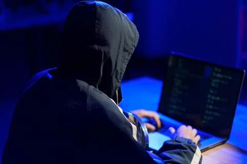Hacker cyberattack representing data breach and cybersecurity threat in digit Stock Photos