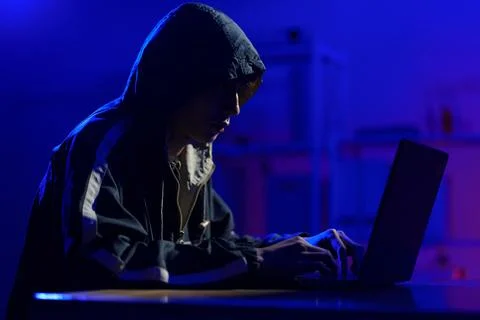 Hacker cyberattack representing data breach and cybersecurity threat in digit Stock Photos