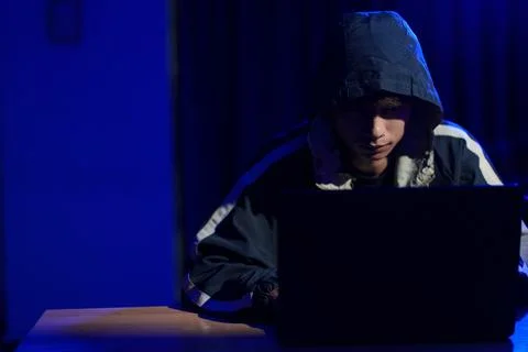 Hacker cyberattack representing data breach and cybersecurity threat in digit Stock Photos