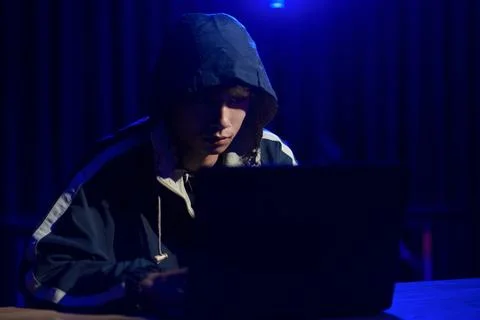 Hacker cyberattack representing data breach and cybersecurity threat in digit Stock Photos