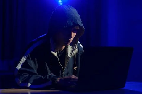 Hacker cyberattack representing data breach and cybersecurity threat in digit Stock Photos