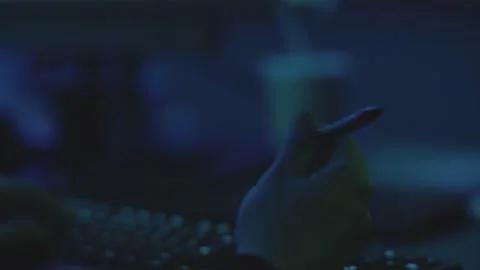 Hacker in the Dark Atmosphere is playing nervously with the pen. Stock Footage 165610348