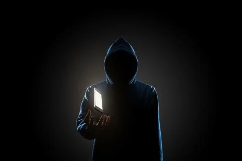 Hacker in dark background concept Stock Photos