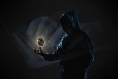 Hacker in dark background concept Stock Photos