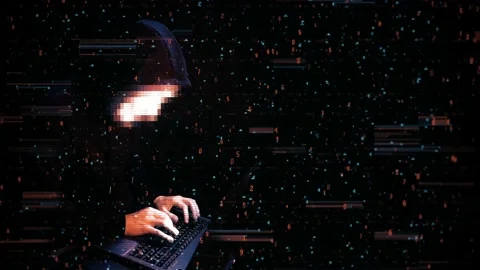 Hacker on a dark background working on a laptop keyboard Stock-Footage 114994179