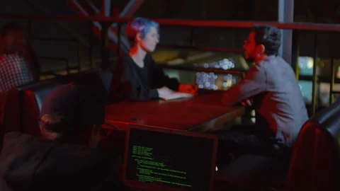 Hacker Developing Software in Café Video stock 105291094