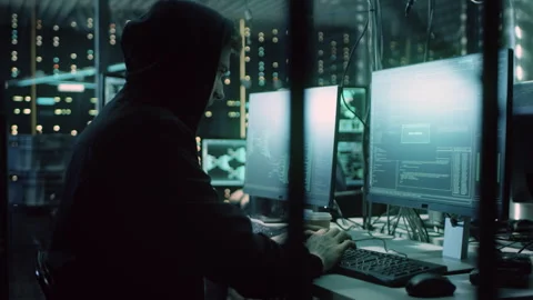 Hacker Does Cybercrime using Computer Stock Footage 321000588