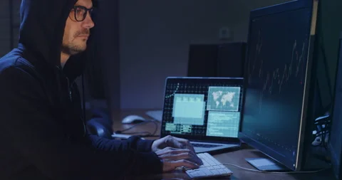Hacker does digital machinations on online stock exchange Video stock 189238182