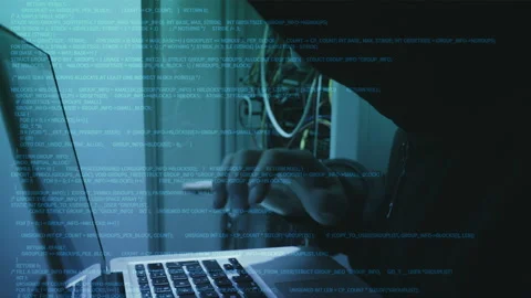 Hacker entering malicious code into data center. Stock Footage 88576485