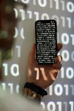 Hacker examining computer code Foto stock