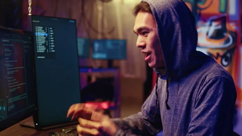 Hacker excited after developing exploit Stock Footage 256941848