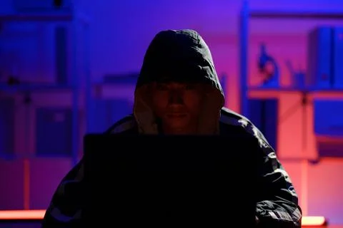 Hacker executing cyberattack to breach data and compromise digital security Stock Photos