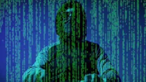 Hacker, with face hidden, programming virus and data. Stock Footage 142991893