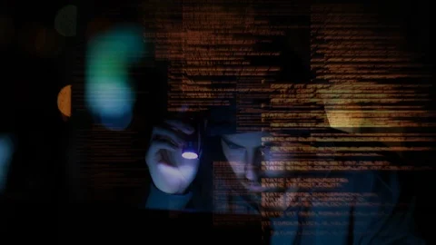 Hacker with flashlight and coding moves on the foreground Stock Footage 104924169