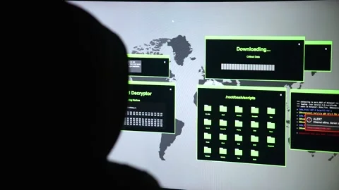 Hacker in front of a screen Stock Footage 280435836