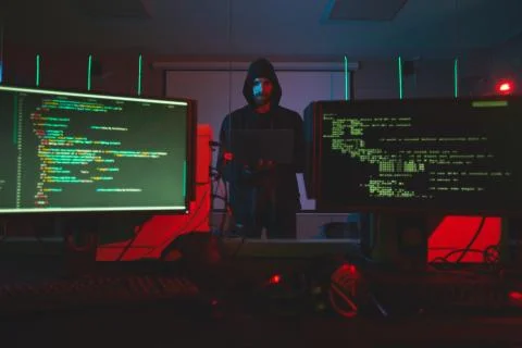 Hacker getting into computer system 스톡 사진