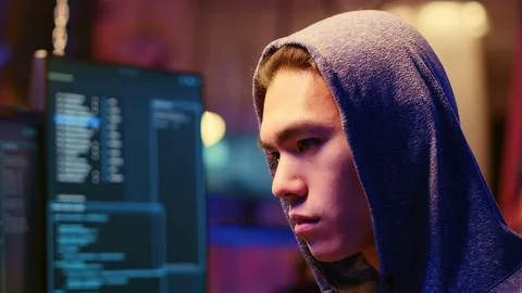 Hacker getting past computers defenses 스톡 사진